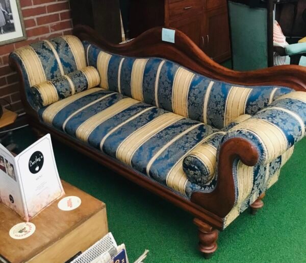 Sofa with bolster cushions