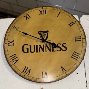 Large rustic Guinness clock