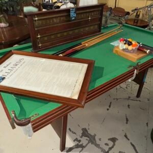 Pool table and accessories (including snooker marker by E.J. Riley & Framed Billiards Rules, two sets of balls and pool sticks)