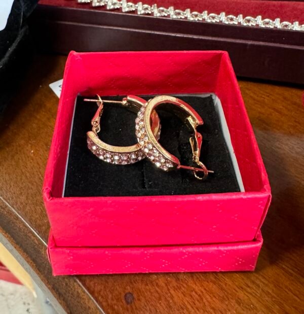 Gold tone half hoop earrings