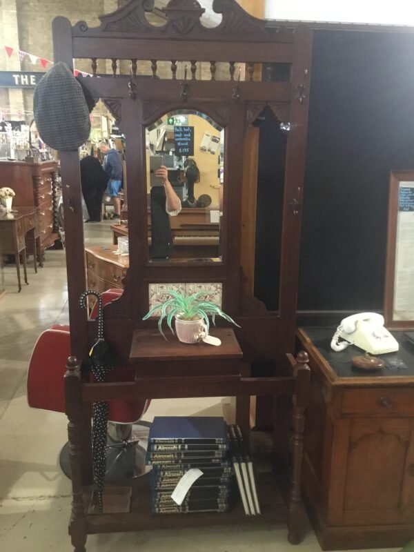 Antique coat, hat and umbrella hallway stand