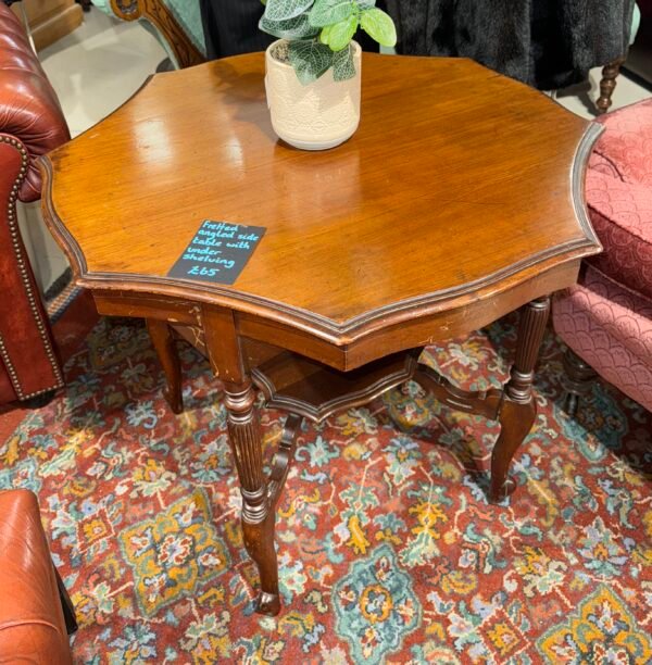 Fretted angled side table with under shelving