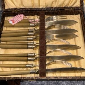 Antique set of 11 nickel silver fish knives and forks