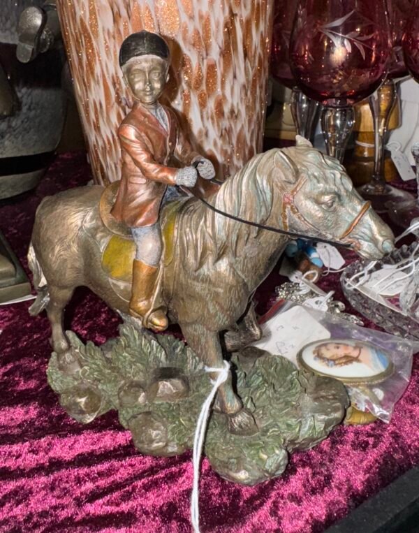 Veronese boy riding a pony