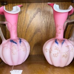 Pair of Victorian pink satin glass pitchers