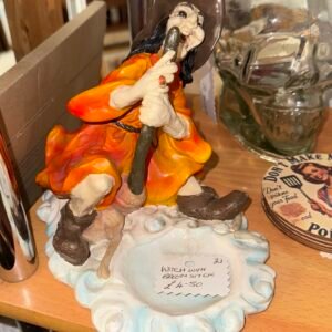 Witch with broom stick