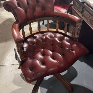 Red swivel captains chair