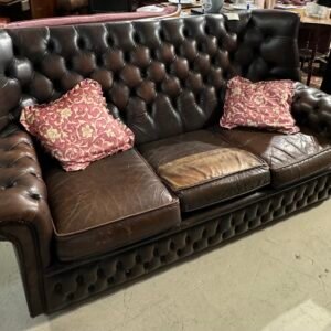 Brown chesterfield sofa