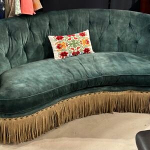 Large green velvet kidney shape button back sofa