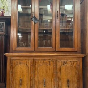 Large light wood display unit, honey oak finish with 3 glass fronted doors